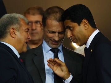 Joan Laporta, Aleksander Ceferin y Nasser Al-Khelaifi, en Montjuic