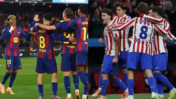 Los jugadores de Barcelona y Atlético de Madrid celebran un gol Los jugadores de Barcelona y Atlético de Madrid celebran un gol
