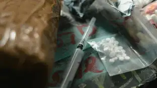 Imagen de drogas y una jeringuilla Imagen de drogas y una jeringuilla