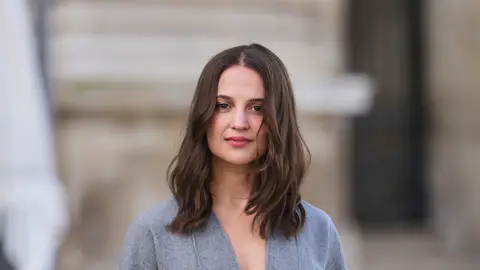 Mujer con el cabello castaño Mujer con el cabello castaño