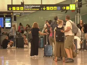 Viajeros en el aeropuerto Viajeros en el aeropuerto