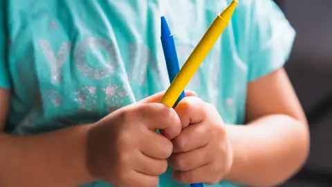 Un niño en la escuela Un niño en la escuela