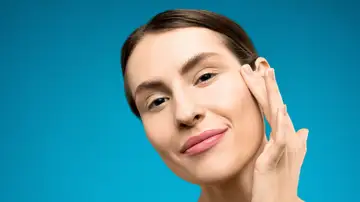 Mujer con el rostro radiante Mujer con el rostro radiante
