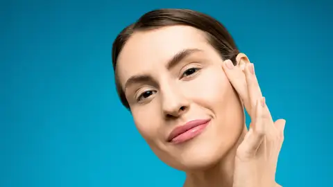 Mujer con el rostro radiante Mujer con el rostro radiante