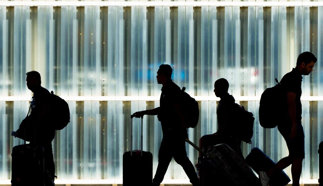Pasajeros en un aeropuerto