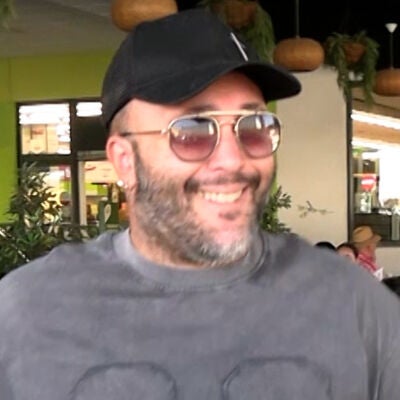 Kiko Rivera sonriente con la prensa