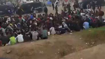 &Uacute;ltima hora de la crisis migratoria en Ceuta, en directo: La Polic&iacute;a Nacional desaloja la playa del Trampol&iacute;n